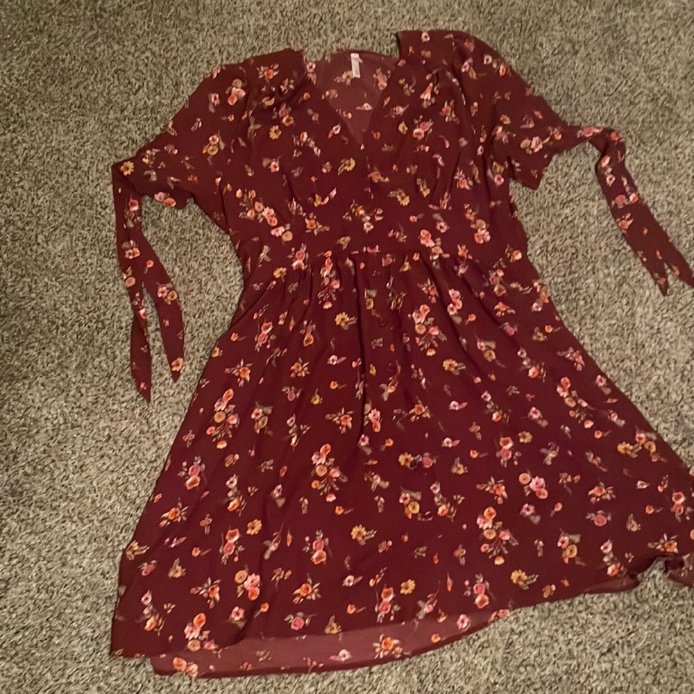 Red floral dress with tie sleeves and button detail